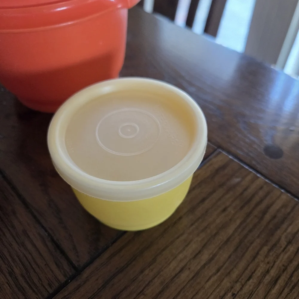 Colorful vintage Tupperware.  2 snack cups One 20 oz storage bowl.